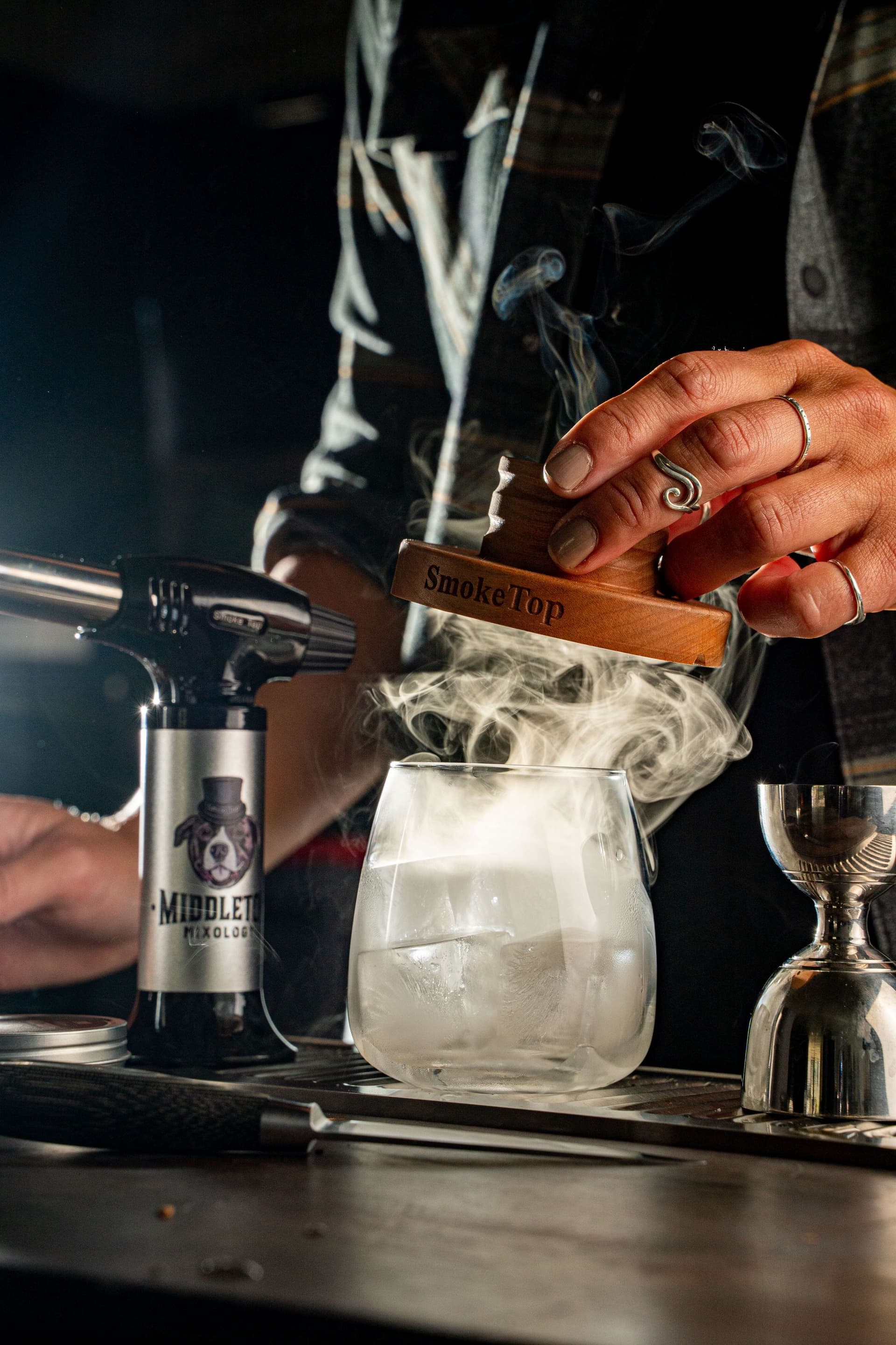 SmokeTop cocktail smoker placed on top of an old fashioned glass